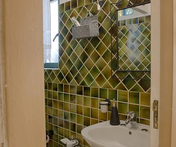 La Casetta Al Centro Di オルビア